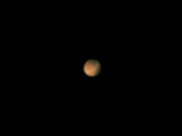 Mars imaged using a 150 mm scope. Credit-Sergei Golyshev under a Creative Commons Share-Alike 2.0 Generic License.