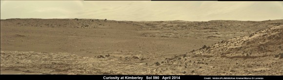 Curiosity scans scientifically intriguing rock outcrops of Martian terrain at ‘The Kimberley’ waypoint in search of next drilling location, beside low hill at right. Mastcam color photomosaic assembled from raw images snapped on Sol 590, April 4, 2014. Credit: NASA/JPL/MSSS/Ken Kremer - kenkremer.com/Marco Di Lorenzo