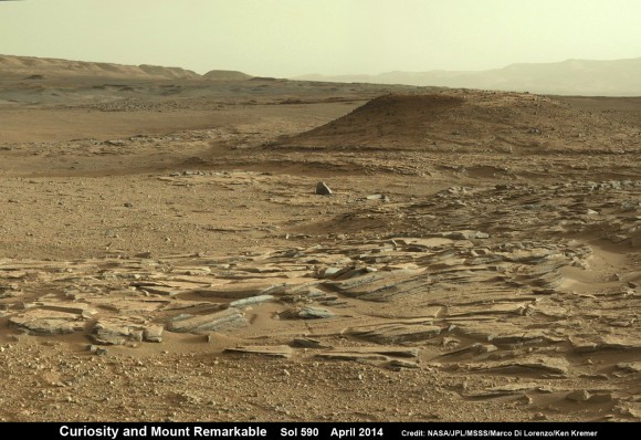 Curiosity scans scientifically intriguing rock outcrops of gorgeous Martian terrain at ‘The Kimberley’ waypoint in search of next drilling location beside Mount Remarkable butte, at right. Mastcam color photo mosaic assembled from raw images snapped on Sol 590, April 4, 2014. Credit: NASA/JPL/MSSS/Marco Di Lorenzo/Ken Kremer - kenkremer.com