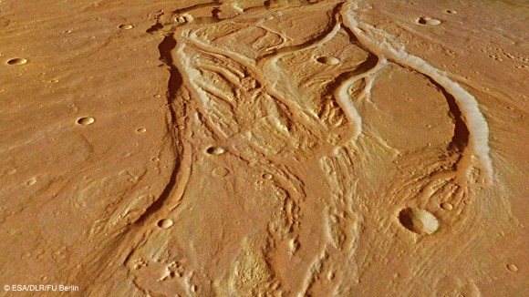 A close-up view of Osuga Valles created from data acquired with the Mars Express' High Resolution Stereo Camera. Water flowed towards the top of this image. Credit: ESA/DLR/FU Berlin