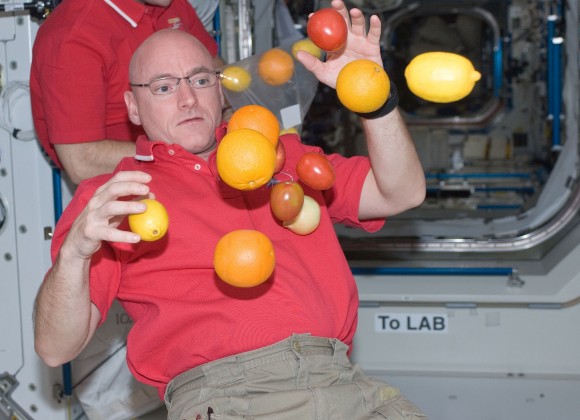 NASA astronaut Scott Kelly plays with fresh fruit in the Unity node of the International Space Station. This 2010 picture was taken during Expedition 25. Credit: NASA