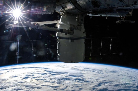 SpaceX Dragon cargo freighter berthed to the International Space Station during recently concluded SpaceX-3 mission in May 2014.  An upgraded, manrated version will carry US astronauts to space in the next two to three years.  Credit: NASA