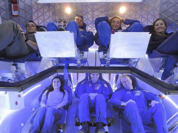 NASA astronauts and industry experts check out the crew accommodations in the Dragon spacecraft under development by SpaceX. The evaluation in Hawthorne, Calif., on Jan. 30, 2012, was part of SpaceX's Commercial Crew Development Round 2 agreement with NASA's Commercial Crew Program. Credit: NASA