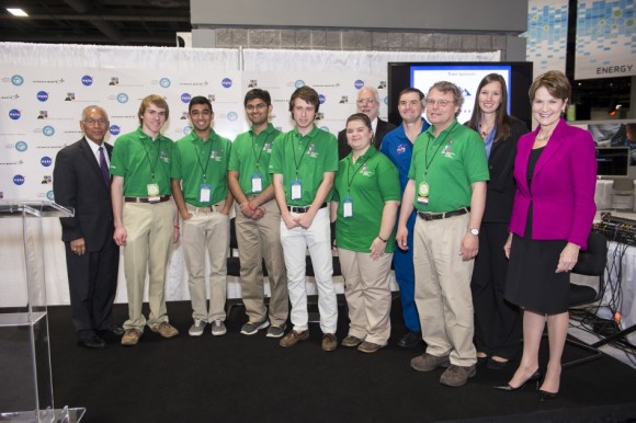 Exploration Design Challenge Winning Team NASA’s Administrator, Charles Bolden (left), President/CEO of Lockheed Martin, Marillyn Hewson (right), and astronaut Rex Walheim (back row) pose for a group photo with the winning high school team in the Exploration Design Challenge. Team ARES from the Governors School for Science and Technology in Hampton, Va. won the challenge with their radiation shield design, which will be built and flown aboard the Orion/EFT-1. The award was announced at the USA Science and Engineering Festival on April 25, 2014 at the Washington Convention Center. Credit: NASA/Aubrey Gemignani