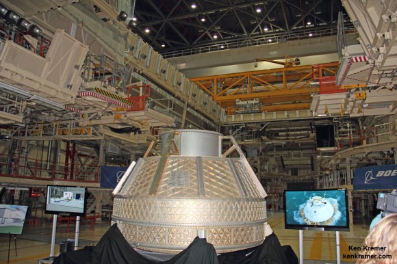 Early version of Boeing CST-100 pressure vessel mockup inside OPF-3 and surrounded by shuttle era scaffolding at the Kennedy Space Center, FL. Credit: Ken Kremer – kenkremer.com