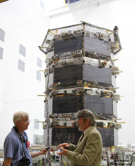 MMS Project Manager Craig Tooley (right) and Ken Kremer (Universe Today) discuss science objectives of NASA’s upcoming Magnetospheric Multiscale mission by 20 foot tall mated quartet of stacked spacecraft at the cleanroom at NASA's Goddard Space Flight Center in Greenbelt, Md., on May 12, 2014. Credit: Ken Kremer- kenkremer.com