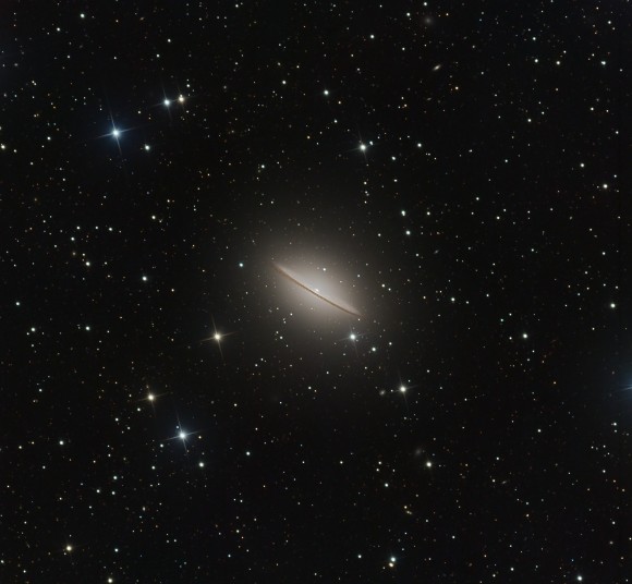 A expanded view of M104, the Sombrero Galaxy and the surrounding region. Credit and copyright: Ian Sharp.