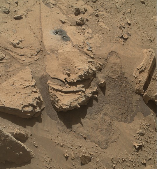 This May 12, 2014, view from the Mars Hand Lens Imager (MAHLI) in NASA's Curiosity Mars Rover shows the rock target "Windjana" and its immediate surroundings after inspection of the site by the rover by drilling and other activities. Credit: NASA/JPL-Caltech/MSSS