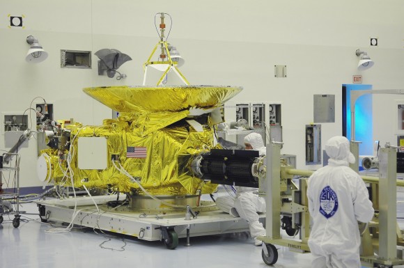 New Horizon in the clean room having its plutonium-fueled MMRTG installed. (Credit: NASA).