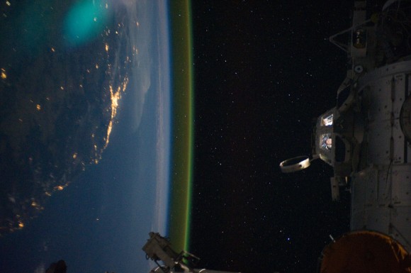 At left, Australia at night. At right, the Cupola on the International Space Station. Credit: NASA/ISS