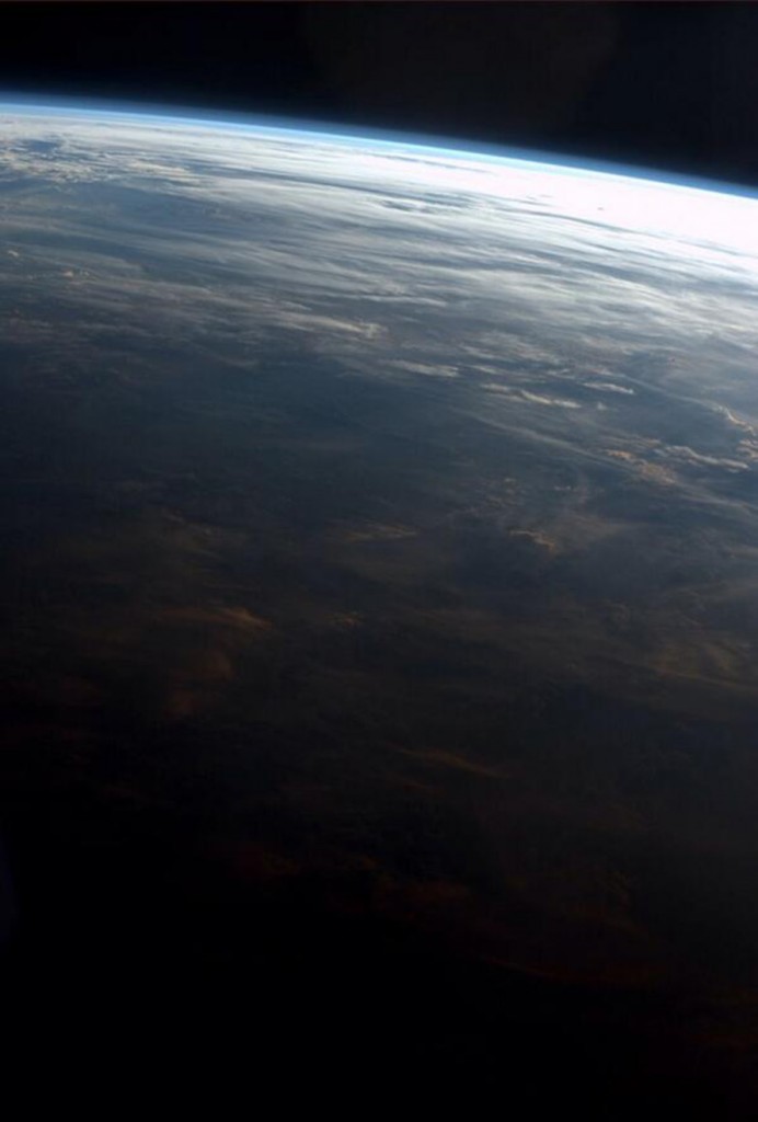 Pink clouds at sunset may look beautiful from Earth but "not as pretty here" according to Reid Wiseman