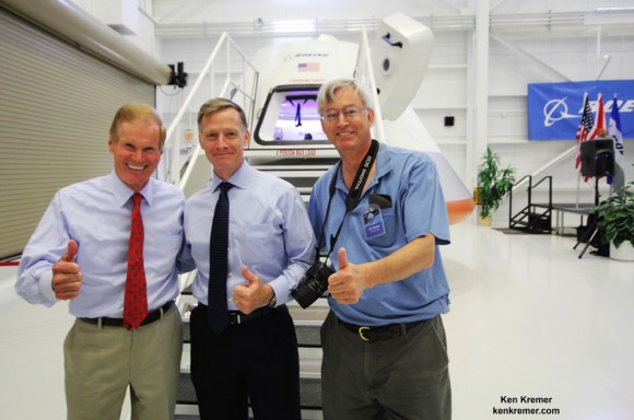 It's 'Thumbs Up' for unveiling of Boeing's CST-100 Space Taxi at NASA's Kennedy Space Center on June 9, 2014. Florida's US Sen. Bill Nelson (left), final shuttle commander Chris Ferguson (now Director of Boeing’s Crew and Mission Operations, center) and Ken Kremer/Universe Today pose in front of capsule with stairway leading to open hatch. Credit: Ken Kremer - kenkremer.com