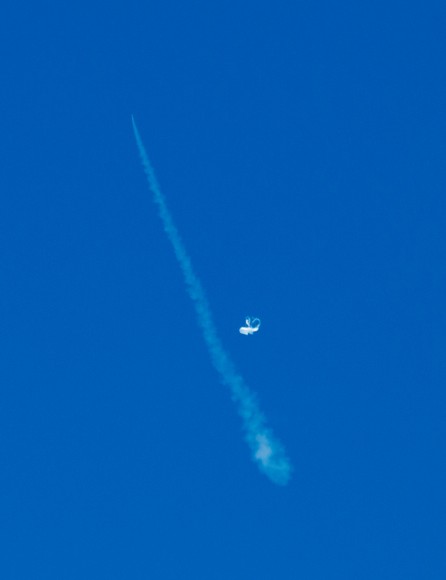 The Low-Density Supersonic Decelerator (LDSD) soars into the sky during a test flight June 28, 2014 (invisible at top of contrail) while its carrier balloon floats in the frame. Credit: NASA/JPL-Caltech