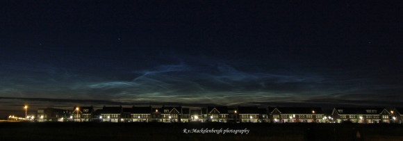 Noctilucent clouds over the city of Rosmalen, Holland, July 3, 2014. Taken with Canon 60D, 28 mm lens. Credit: Rob van Mackelenbergh