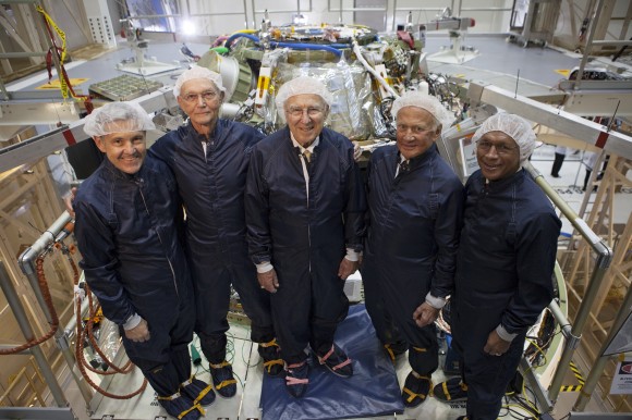 At the Kennedy Space Center in Florida, NASA officials and Apollo astronauts view the Orion crew module inside the Operations and Checkout Building, newly named for Apollo 11 astronaut Neil Armstrong, the first person to set foot on the moon. Viewing Orion from left, are Kennedy Center Director Bob Cabana, Apollo 11 astronaut Michael Collins, Apollo astronaut Jim Lovell, Apollo 11 astronaut Buzz Aldrin, and NASA Administrator Charlie Bolden. Photo credit: NASA/Kim Shiflett