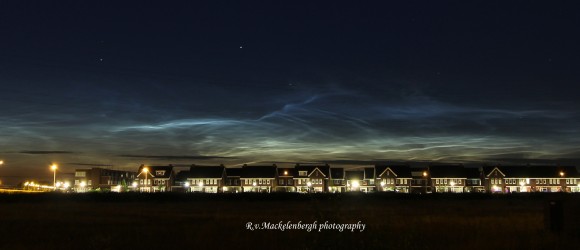 Noctilucent clouds over the city of Rosmalen, Holland, July 3, 2014. Taken with Canon 60D, 28 mm lens. Credit: Rob van Mackelenbergh