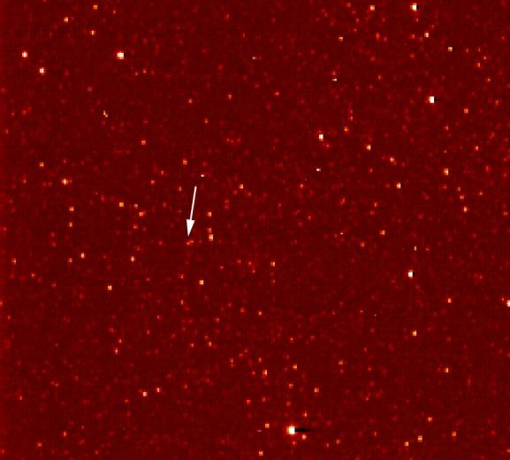 Pluto appears as a faint white dot (see arrow) in this image taken by New Horizons in September 2006, nine months after launch. Credit: NASA/Johns Hopkins University Applied Physics Laboratory/Southwest Research Institute