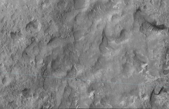 This June 27, 2014, image from the HiRISE camera on NASA's Mars Reconnaissance Orbiter shows NASA's Curiosity Mars rover on the rover's landing-ellipse boundary, which is superimposed on the image. The 12-mile-wide ellipse was mapped as safe terrain for its 2012 landing inside Gale Crater. Image Credit: NASA/JPL-Caltech/Univ. of Arizona