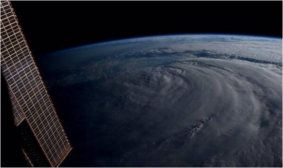 “Neoguri has been literally cut in half. Unreal.” Taken from the ISS on 8 July 2014. Credit: NASA/Reid Wiseman