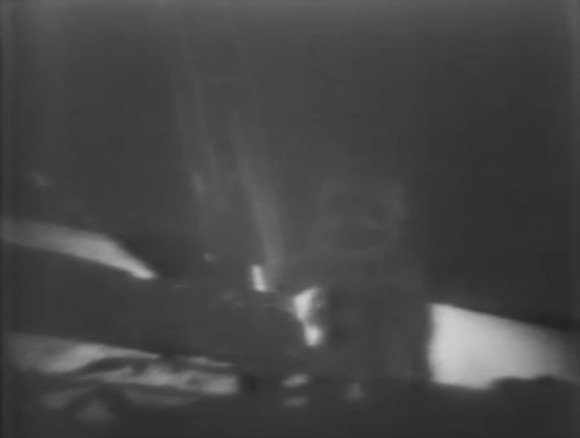 Apollo 11 commander Neil Armstrong stands on the moon's surface on July 20, 1969, the first human to do so. Credit: NASA/CBS/YouTube (screenshot)