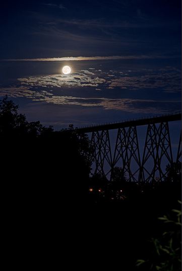 A 3-exoposure of the full Moon on July 12, 2014, taken near Cap-Rouge, Quebec City, Quebec, Canada. Credit and copyright: Denis Marquis.