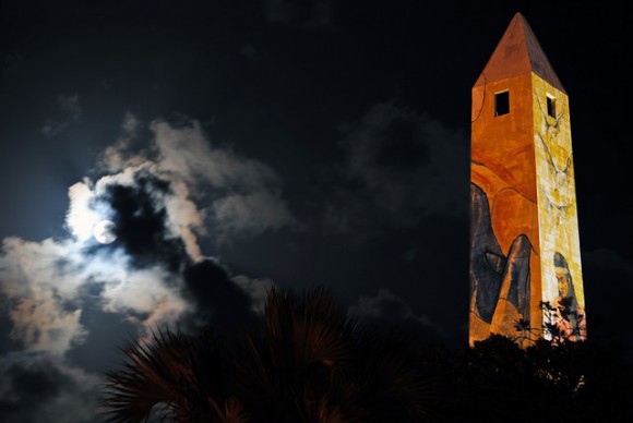 A cloudy look at the perigee Moon of August 10, 2014 along side the Desde el Obelisco, Malecón de Santo Domingo, Dominican Republic. Credit and copyright: Goku Abreu.