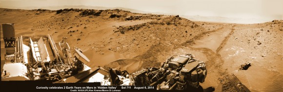 2 Earth Years on Mars! NASA’s Curiosity rover celebrated the 2nd anniversary on Mars at ‘Hidden Valley’ as shown in this photo mosaic view captured on Aug. 6, 2014, Sol 711. Note the valley walls, rover tracks and distant crater rim. Navcam camera raw images stitched and colorized. Credit: NASA/JPL-Caltech/Ken Kremer-kenkremer.com/Marco Di Lorenzo