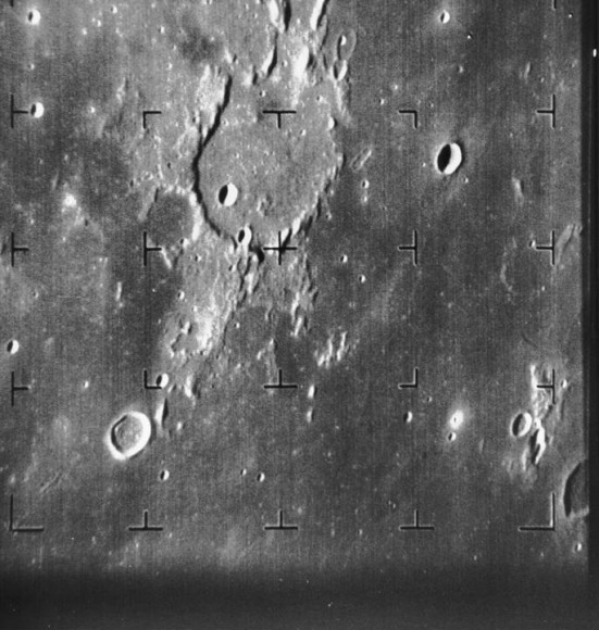 Guericke Crater as seen by Ranger 7. Ranger 7 B-camera image of Guericke crater (11.5 S, 14.1 W, diameter 63 km) taken from a distance of 1335 km. The dark flat floor of Mare Nubium dominates most of the image, which was taken 8.5 minutes before Ranger 7 impacted the Moon on 31 July 1964. The frame is about 230 km across and north is at 12:30. The impact site is off the frame to the left. Credit: NASA/JPL-Caltech