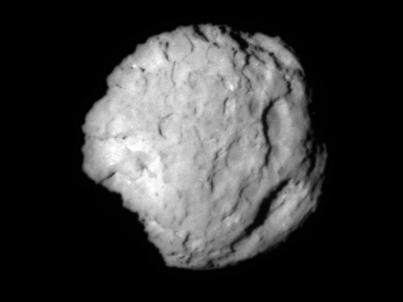Comet 81P/Wild 2 photographed during the Stardust mission in 2004. Wild 2 measures 1.03 x 1.24 x 1.71 miles and goes around the sun once every 6.4 years. Its surfaced is riddled with flat-bottomed craters, some of which may also be gas vents from vaporized ice. Credit: NASA