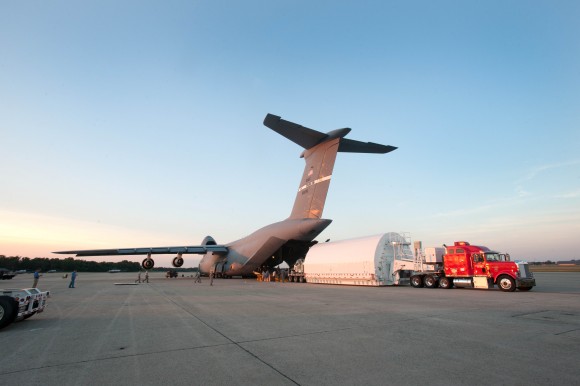The Webb telescope backplane "pathfinder" or practice-model was unloaded from a C-5 aircraft at the U.S. Air Force's Joint Base Andrews in Maryland. Image Credit: NASA/Desiree Stover