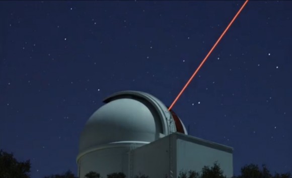 Still from a timelapse video showing the Robo-AO laser originating from the Palomar 1.5-meter Telescope dome. The laser is not visible to human eyes, but do show up in digital cameras if their UV blocking filters are removed. Credit: Institute for Astronomy, University of Hawaii / YouTube (screenshot)