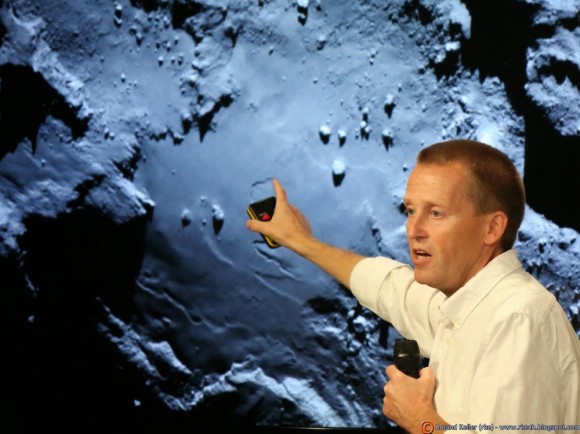 Holger Sierks, OSIRIS principal investigator, discusses spectacular hi res comet images returned so far by Rosetta during the Aug. 6 ESA webcast from mission control at ESOC, Darmstadt, Germany. Credit: Roland Keller