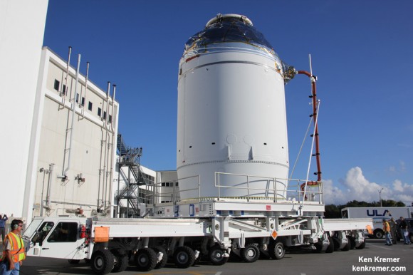 NASA's completed Orion EFT 1 crew module loaded on wheeled transporter during move to Launch Abort System Facility (LASF) on Sept. 11, 2014 at the Kennedy Space Center, FL.  Credit: Ken Kremer - kenkremer.com  
