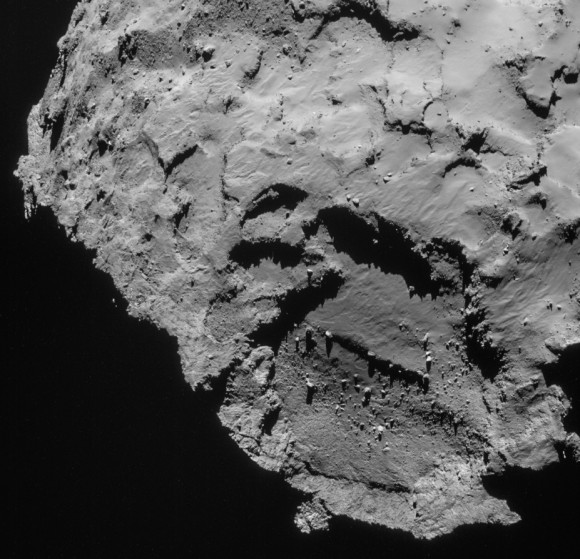 NAVCAM image of the comet on 21 September, which includes a view of primary landing site J. Click for more details and link to context image. (Credits: ESA/Rosetta/NAVCAM)