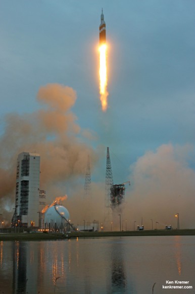 NASA’s first Orion spacecraft blasts off at 7:05 a.m. atop United Launch Alliance Delta 4 Heavy Booster at Space Launch Complex 37 (SLC-37) at Cape Canaveral Air Force Station in Florida on Dec. 5, 2014.   Launch pad remote camera view.   Credit: Ken Kremer - kenkremer.com