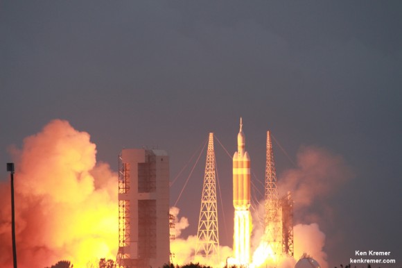 NASA's first Orion spacecraft blasts off at 7:05 a.m. atop United Launch Alliance Delta 4 Heavy Booster at Space Launch Complex 37 (SLC-37) at Cape Canaveral Air Force Station in Florida on Dec. 5, 2014.   Credit: Ken Kremer - kenkremer.com