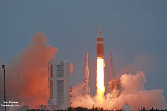 NASA's first Orion spacecraft blasts off at 7:05 a.m. atop United Launch Alliance Delta 4 Heavy Booster at Space Launch Complex 37 (SLC-37) at Cape Canaveral Air Force Station in Florida on Dec. 5, 2014. Credit: Ken Kremer – kenkremer.com 