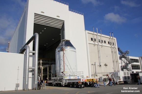 NASA's Orion EFT 1 crew module departs Neil Armstrong Operation and Checkout Building on Sept. 11, 2014 at the Kennedy Space Center, FL, beginning the long journey to the launch pad and planned liftoff on Dec. 4, 2014.  Credit: Ken Kremer - kenkremer.com  